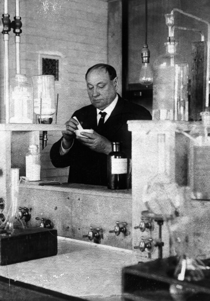 old photo of Harvey Wiley in a lab
