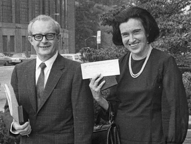 black and white photo of a man and women smiling