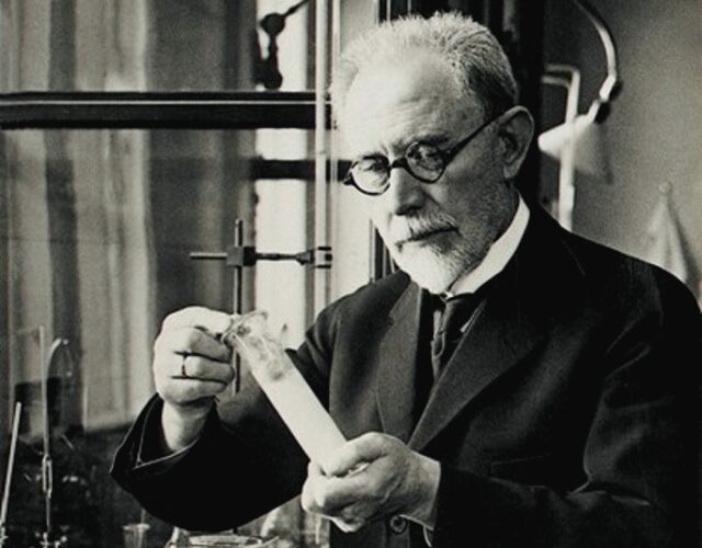 Undated photo of Danish chemist Soren Sorensen working in a lab.