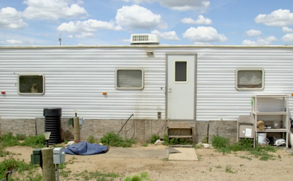 view of the side of a white trailer