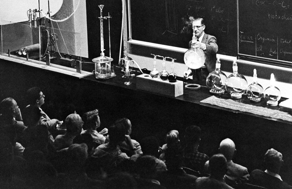 Haagen-Smit giving lecture on smog, ca. 1960s