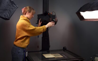 employee using camera equipment