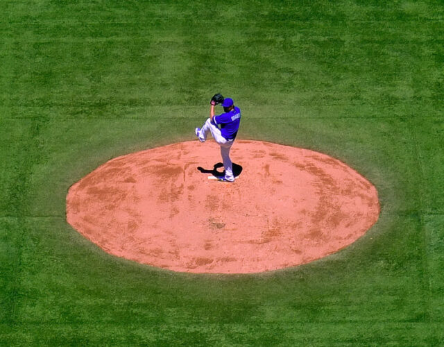 Aerial view of a baseball player winding up to pitch