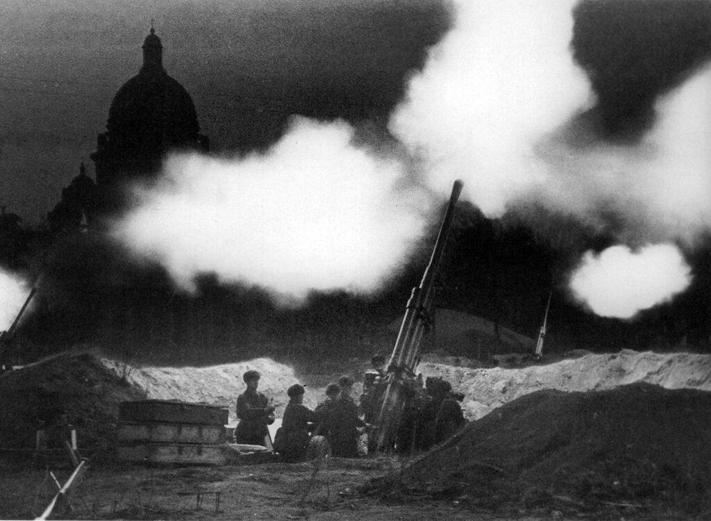 Black and white photo of war scene at night