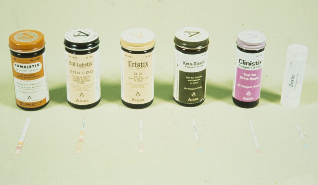 bottles of reagents and strips for diabetes testing