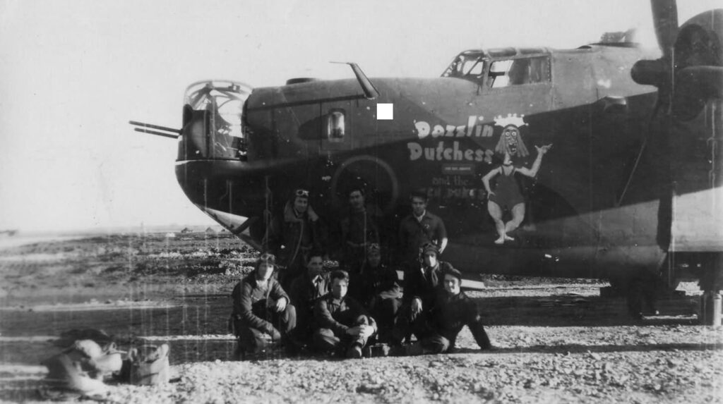 Black and white photo of air force bomber and crew