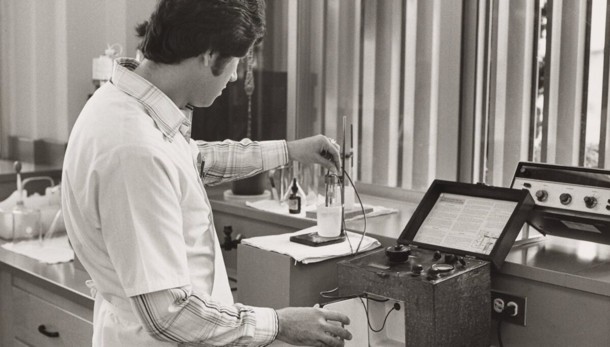 Unidentified man using a Beckman Model G pH meter