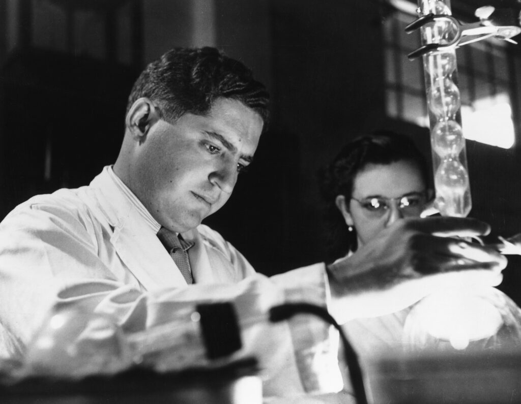 Carl Djerassi at Syntex in 1951, with his assistant Arelina Gonzalez.