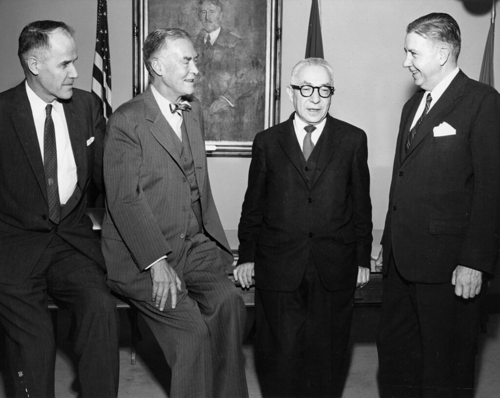 Black and white photo of a group of men