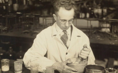 photo of man in a chemistry lab