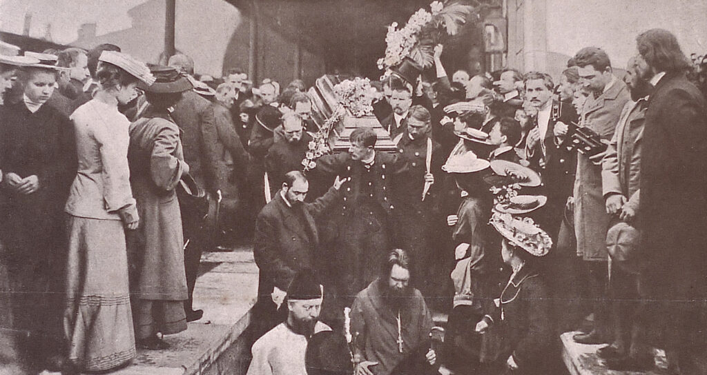 Group of men carrying Chekhov's casket