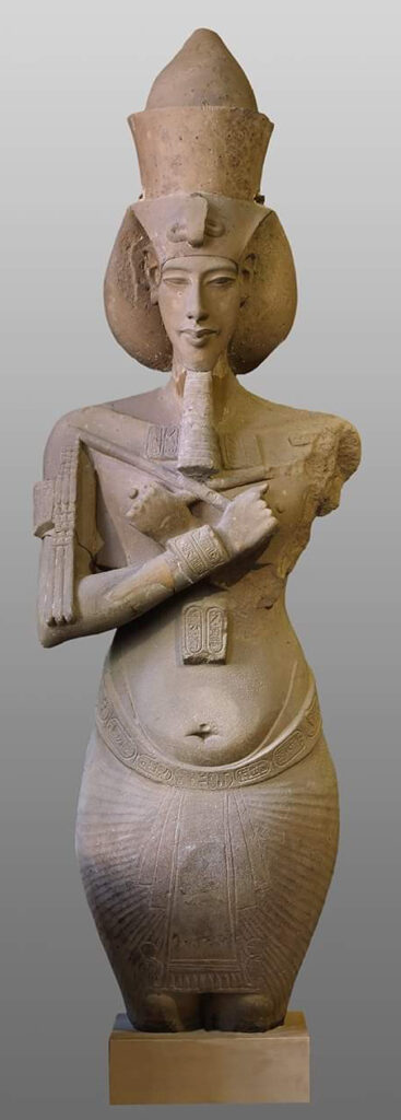 Large, damaged ancient Egyptian statue