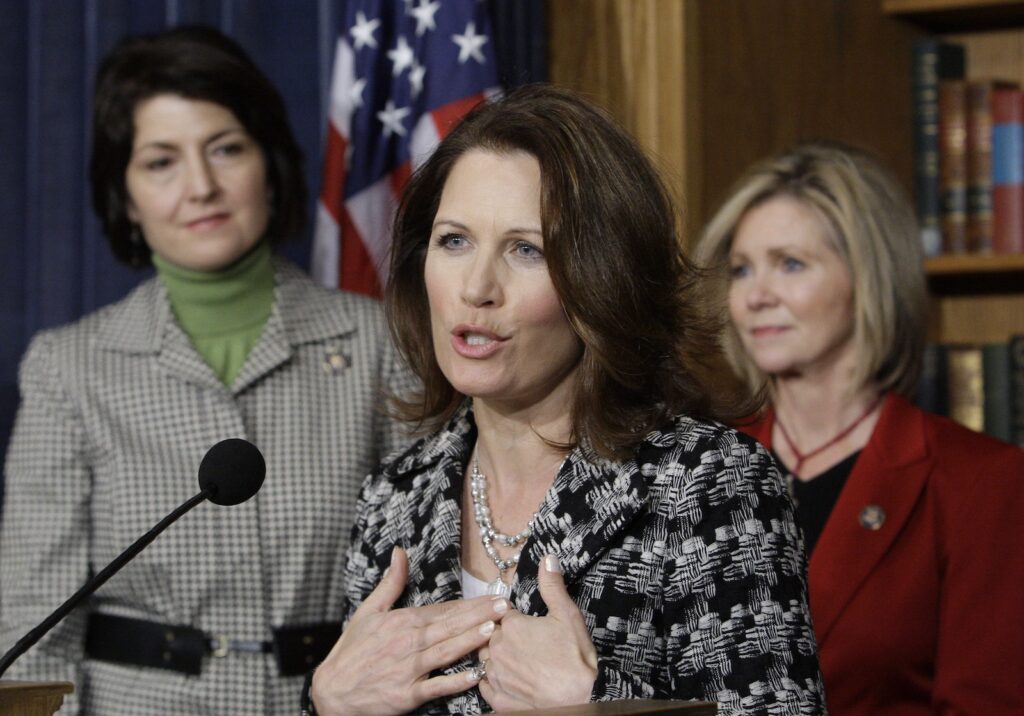 Woman speaks at podium