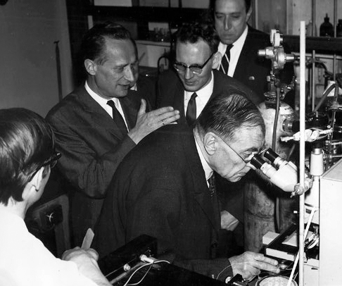 Group of men in a scientific lab