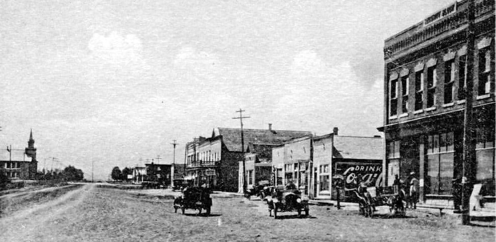old black and white photo of small downtown