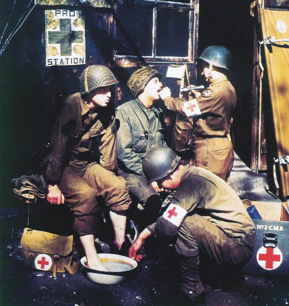 U.S. Army medics treating soldiers in England before the invasion of Normandy, 1944.