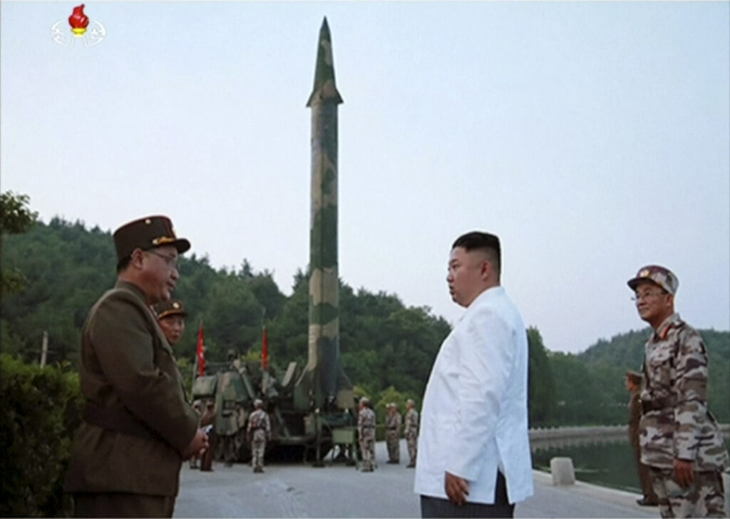 A still image from North Korean state television shows the country’s leader, Kim Jong Un, with a missile launcher, May 2017.