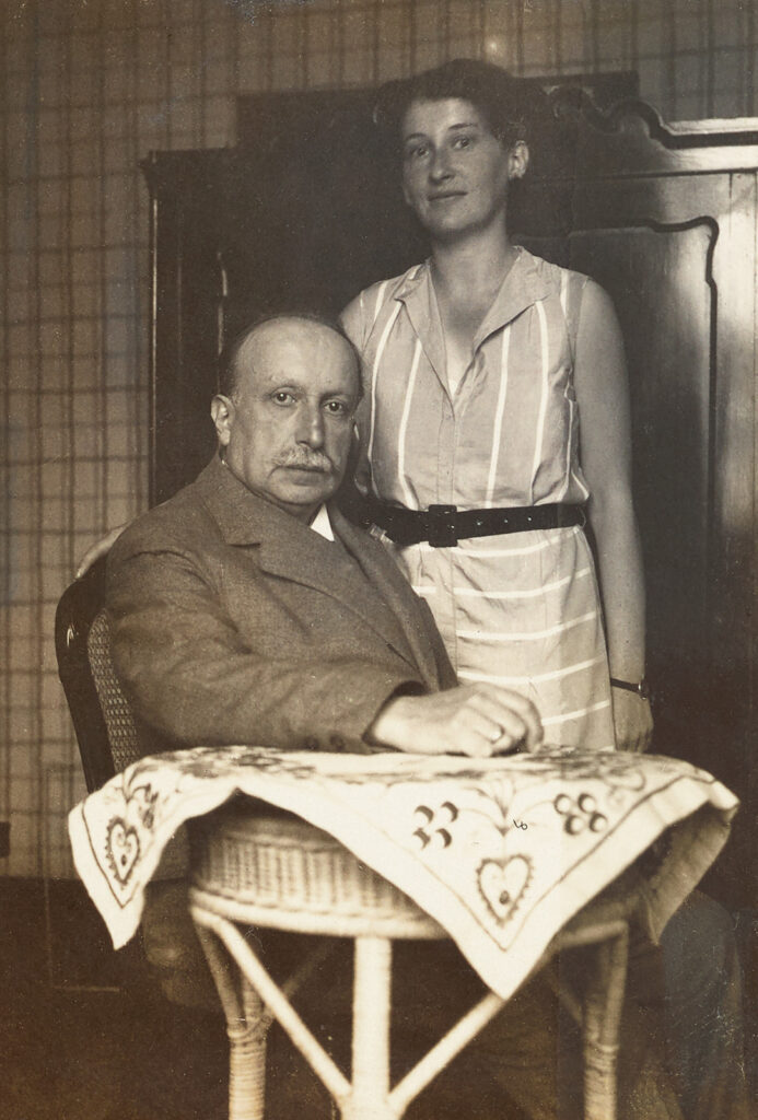 Older man and young woman in kitchen