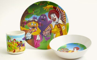 Plate, bowl, and cup with colorful McDonalds-branded images