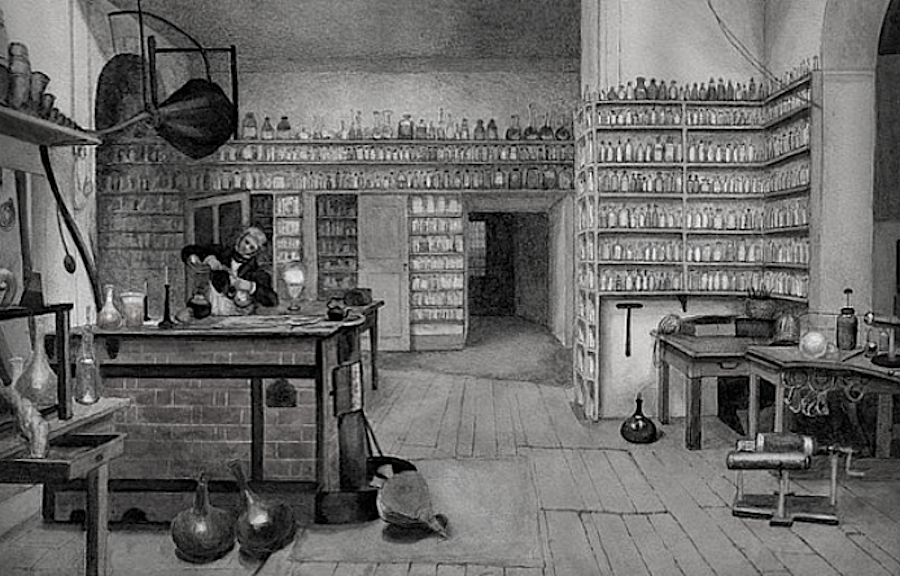 Michael Faraday in his laboratory at the Royal Institution. From a painting by Harriet Moore. 