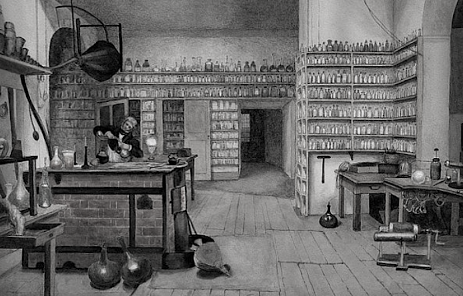 Michael Faraday in his laboratory at the Royal Institution. From a painting by Harriet Moore.