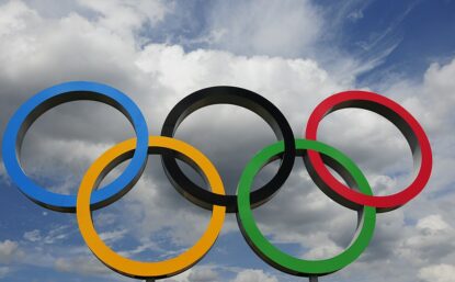 Photo of the Olympic rings with the sky in the background