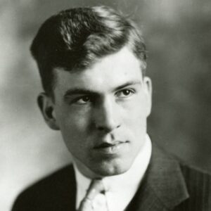 A professional portrait of Donald Othmer as a young man, wearing a suit and tie.