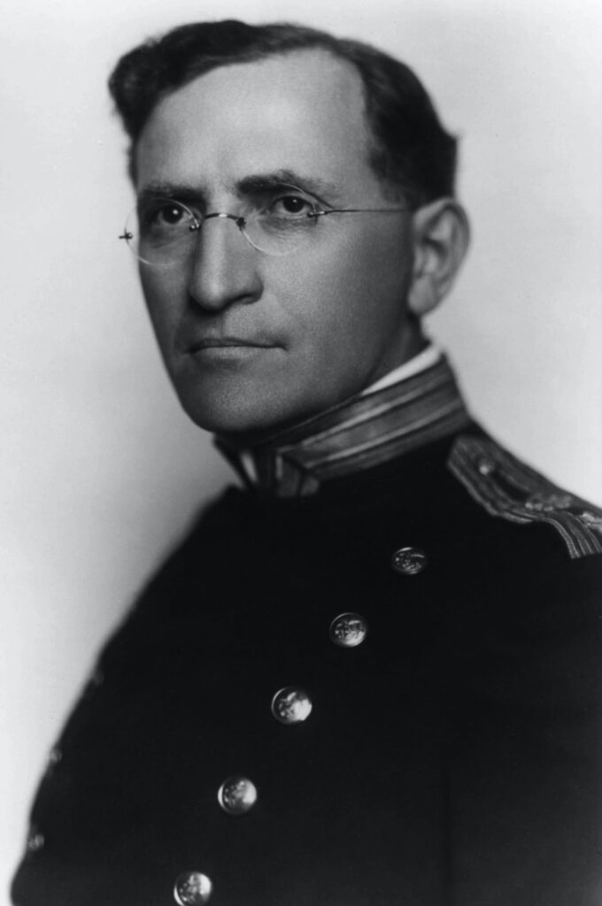 Portrait of a man in uniform and glasses