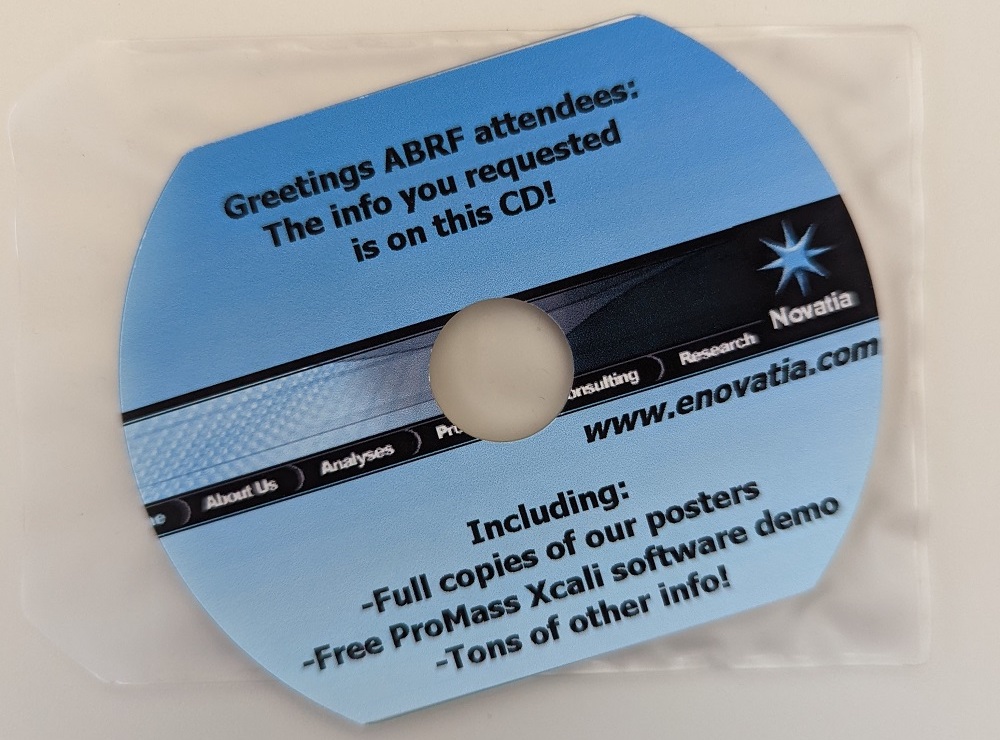 A blue and black business card shaped CD 
