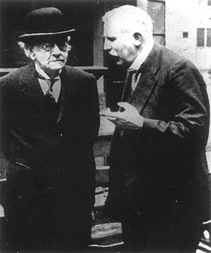J. J. Thomson (left) and Ernest Rutherford in the 1930s. 