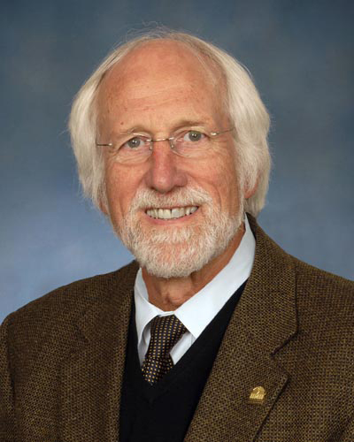 Color photo of a man in a suit