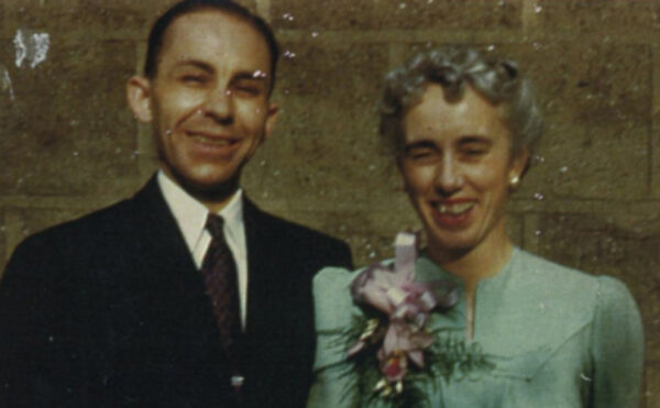 color portrait of man and woman smiling