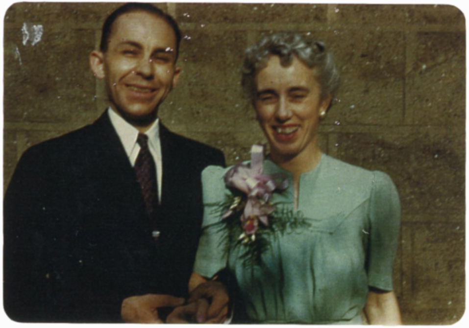 color portrait of man and woman smiling