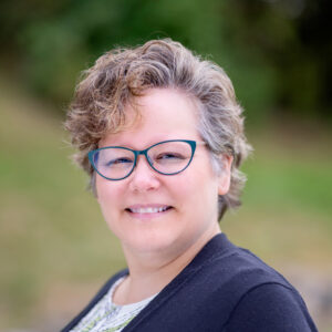 outdoor headshot of Dolly Jørgensen