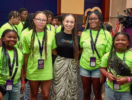 students gathered at a conference