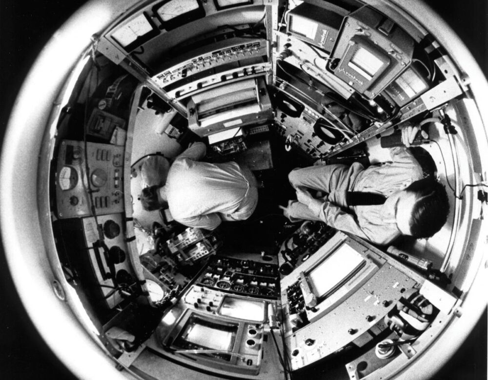 Don Walsh and Jacques Piccard inside a deep sea exploration vehicle.