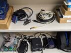 old computer hardware and software on shelves