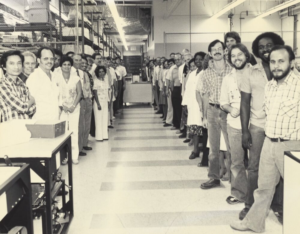 Workers lined up for a group photo