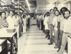 Workers lined up for a group photo