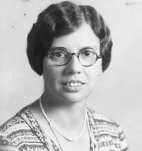 portrait of a women wearing round glasses
