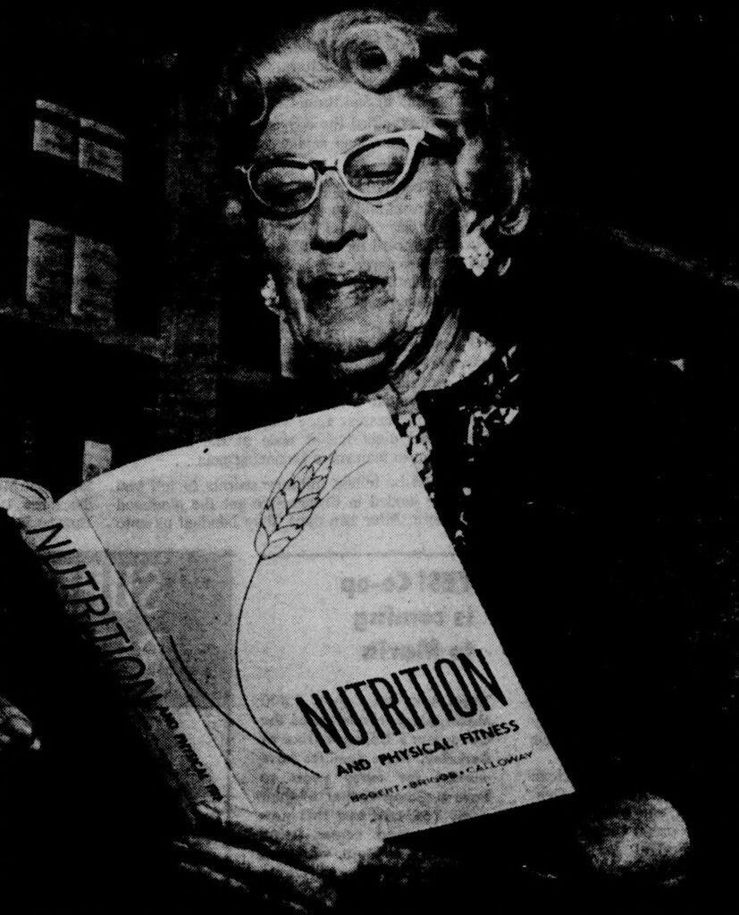 portrait of a women reading a textbook