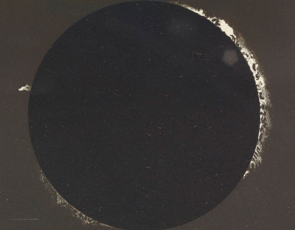 Black and white photos of sun in eclipse