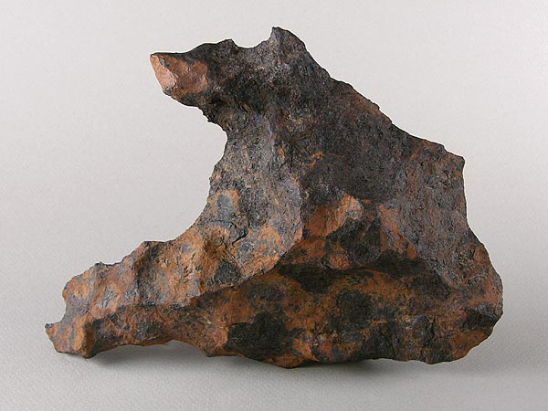 Color photo of a jagged metallic rock