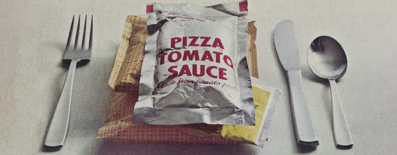 photo of prepackaged pizza with silverware