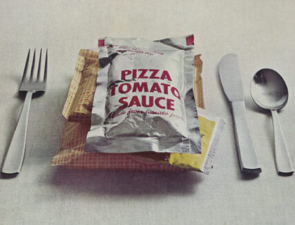photo of prepackaged pizza with silverware