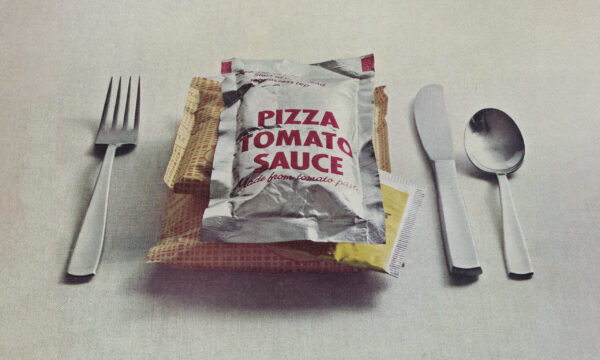 photo of prepackaged pizza with silverware