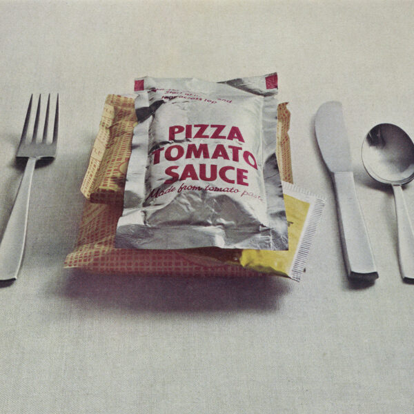 photo of prepackaged pizza with silverware