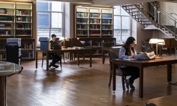 people studying in a library