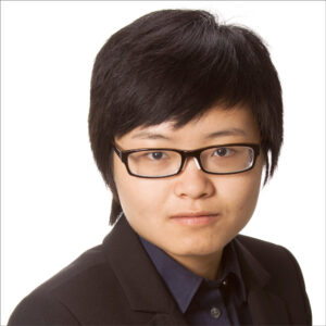 Linqian Feng, wearing glasses, dark suit, over white background