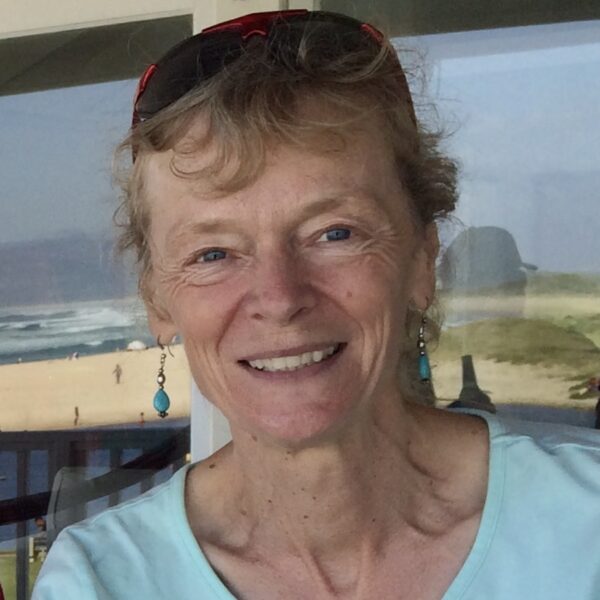 woman in light blue shirt